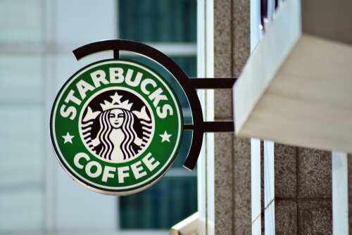 Warsaw,,Poland.,23,April,2018.,Sign,Starbucks,Coffee.,Company,Signboard