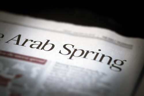 Arab,Spring,Written,Newspaper,,Shallow,Dof,,Real,Newspaper.