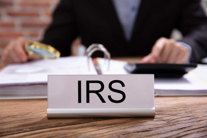 Nameplate,With,Irs,Title,Kept,On,Desk,In,Front,Of