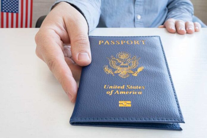 A,Man's,Hand,Gives,An,American,Passport.,Migration,Service,,Document