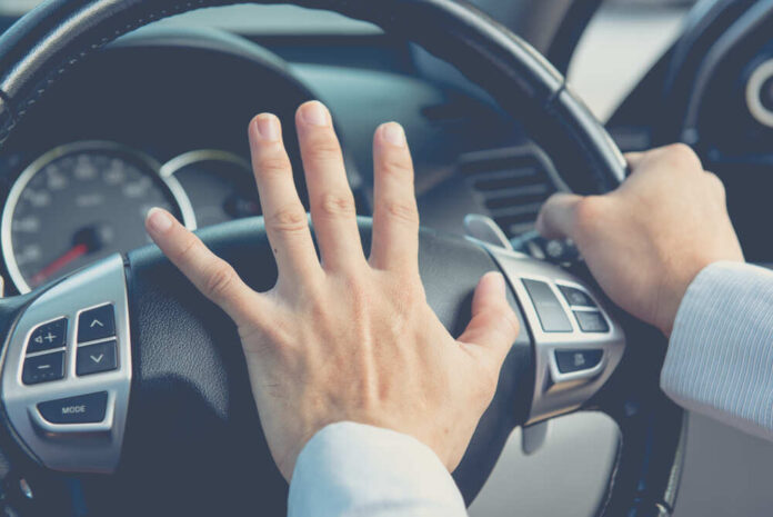Photo,Of,Driver,Honking,In,Traffic,On,The,Road