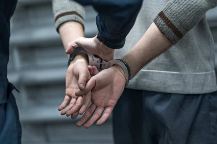Handcuffs,On,The,Prisoner.,Making,An,Arrest.,Remand,In,Custody