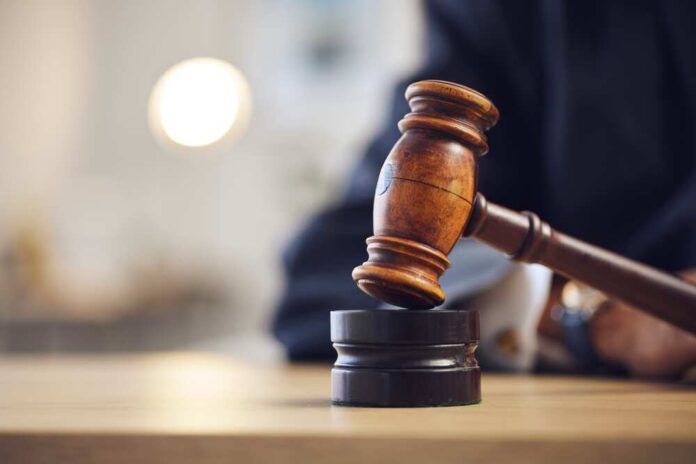 Law,,Judge,And,Closeup,Of,Lawyer,With,Gavel,For,Justice,