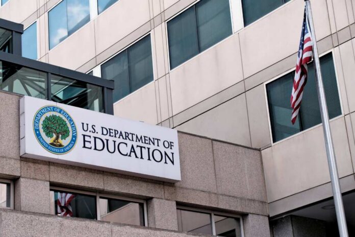 Exterior view of the U.S. Department of Education building with an American flag