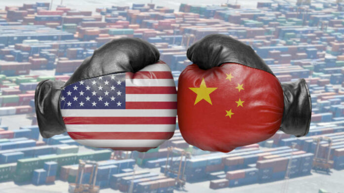 Boxing gloves with US and China flags clash