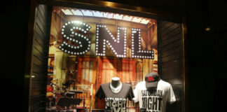 SNL merchandise display in a store window