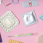 Various contraceptive methods on a pink background