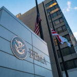 FEMA building with flags at half mast