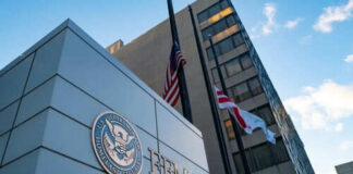 FEMA building with flags at half mast