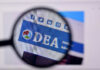 U.S. Prosecutors Target Colombia’s Leftist Leader Magnifying glass focusing on DEA website header