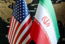 Flags of the United States and Iran displayed together