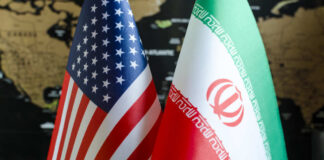Flags of the United States and Iran displayed together