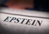 Close-up of a newspaper headline reading 'EPSTEIN'