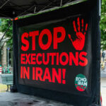 Inside Iran’s 2025–26 Mass Repression Crisis Iran Stop Sign