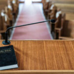 Bible and microphone on a church pulpit