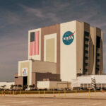 NASAs Vehicle Assembly Building with Artemis sign.