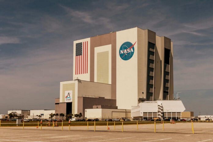 NASAs Vehicle Assembly Building with Artemis sign.