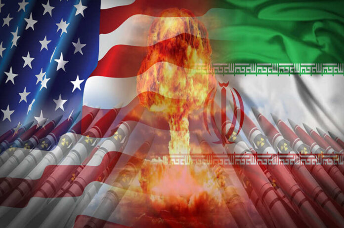 shutterstock_1503500285.jpg A composite image featuring the US and Iranian flags with a nuclear explosion in the center