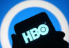 HBO’s Harry Potter Trailer Shatters Viewing Records HBO logo displayed on a smartphone against a blue background