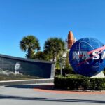 NASA logo and memorial wall featuring John F. Kennedy
