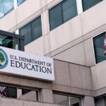 Trump Education Dept TORCHES Title IX Deals Exterior view of the U.S. Department of Education building with an American flag