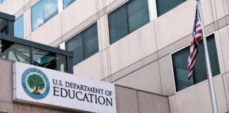 Exterior view of the U.S. Department of Education building with an American flag