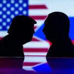 Two silhouettes facing each other with flags background