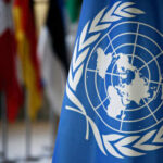UN DEMANDS Release: Gaza Doctor Tortured? United Nations flag with world map emblem displayed