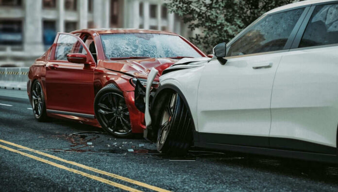 Two cars with severe front-end collision damage.
