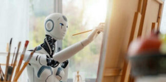 Robot painting on a canvas in art studio.