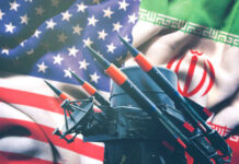Missile system in front of Iranian and American flags