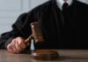 Judge Greenlights Biden Tapes — Brace For Fallout A judge holding a gavel above a wooden block