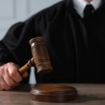 Judge Greenlights Biden Tapes — Brace For Fallout A judge holding a gavel above a wooden block