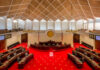 Mortgage Crackdown Hype? Loophole Already Closed Interior view of a legislative chamber with red carpet and wooden accents