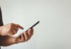 Person using a smartphone with one hand