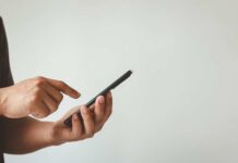 Data-Free Panic Pushes Parents Aside Person using a smartphone with one hand