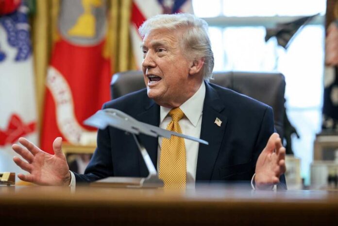President,Donald,J.,Trump,Signs,An,Executive,Order,Creating,An Donald Trump speaking animatedly in the Oval Office