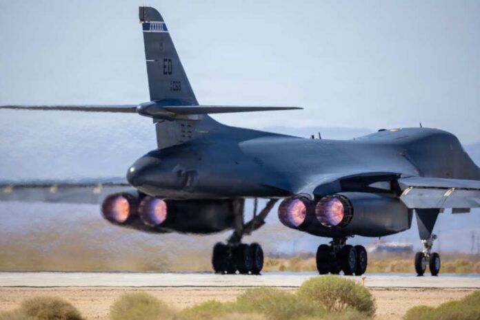 The,Supersonic,Multi-mission,Heavy,Bomber,Continues,Developmental,Testing,With,The B-1 bomber aircraft preparing for takeoff with visible jet engines