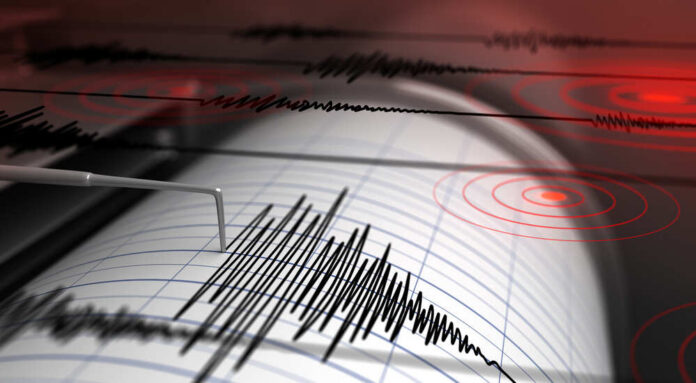 Seismograph,With,Paper,In,Action,And,Earthquake,-,3d,Rendering Close-up of a seismograph recording seismic waves