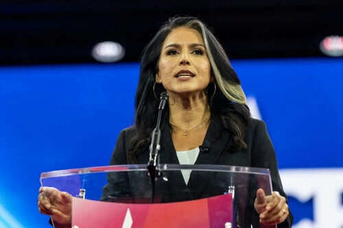 Person speaking at a podium during an event