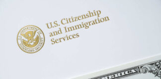 USCIS letterhead with Department of Homeland Security seal and partial naturalization certificate