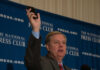 Media Duped By ‘Reformed Nazi’ Arc Man holding phone at National Press Club event
