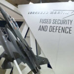 Model airplanes on display with Lockheed Martin branding