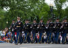 Mount Rushmore Becomes Trump’s Stage Soldiers in dress uniforms march in formation during a parade