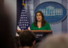 Woman at a White House press briefing podium