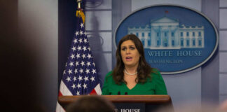 Woman at a White House press briefing podium