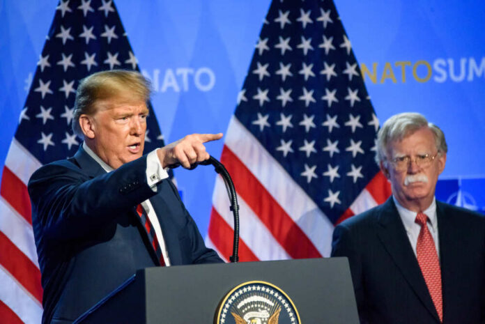 12.07.2018.,Brussels,,Belgium.,Press,Conference,Of,Donald,Trump,,President,Of Two men at a press conference with U.S. flags behind them