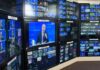 broadcast control room wall of monitors