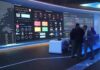 Endgame Boast, Roadmap Blank cybersecurity operations room with large data dashboards and people discussing