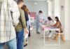 Election Fury Rekindled — With ICE Twist People waiting in line at a polling station to cast their votes